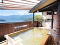 屋上露天風呂は総ヒノキで造られた天然温泉かけ流しの露天風呂